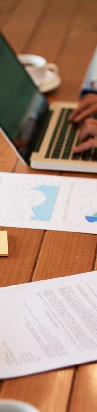 Reading business document Close-up image of entrepreneur checking document before signing